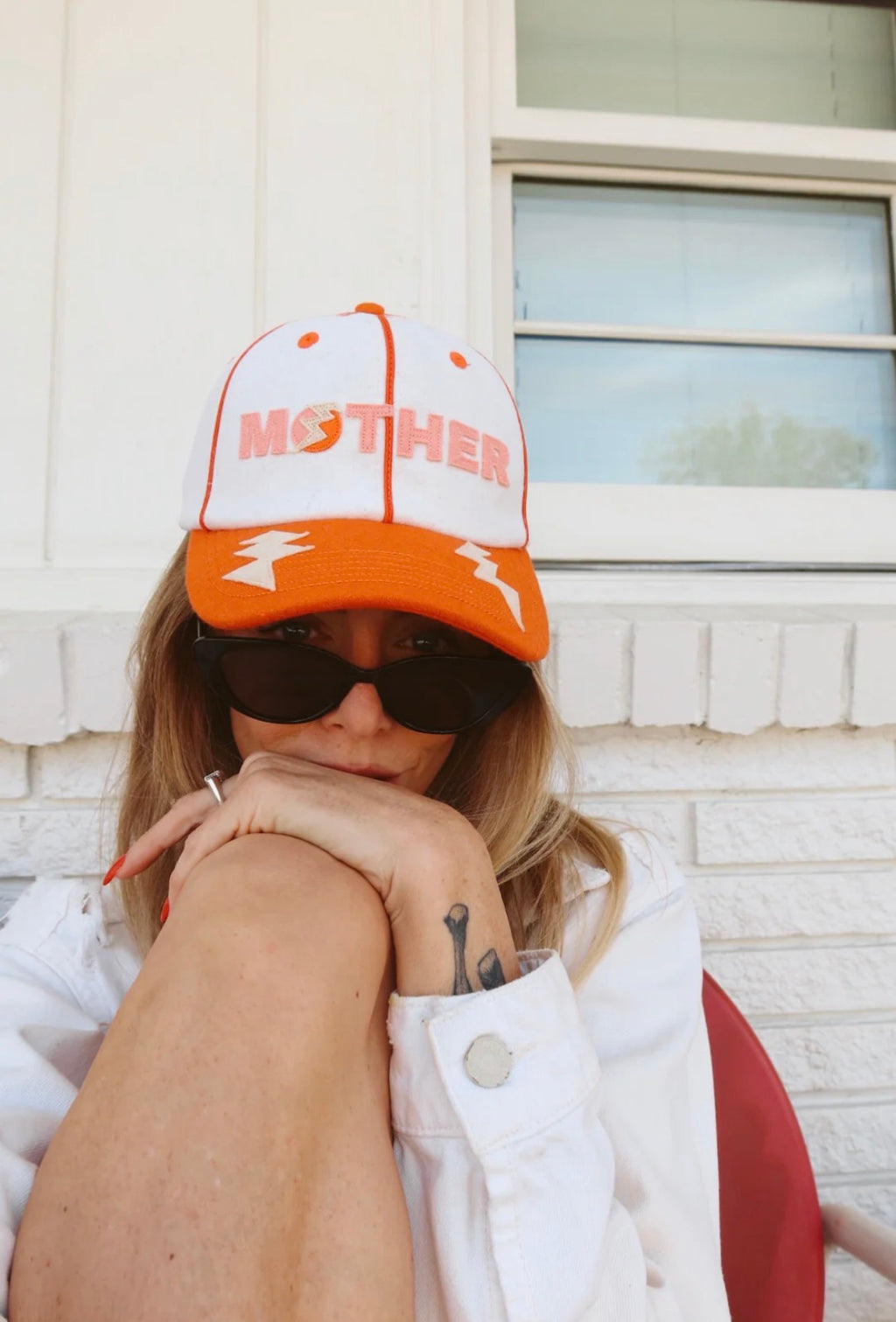 Happy Little Mother trucker hat orange and white – boutique accessories at The Corner Store on Christie Toronto