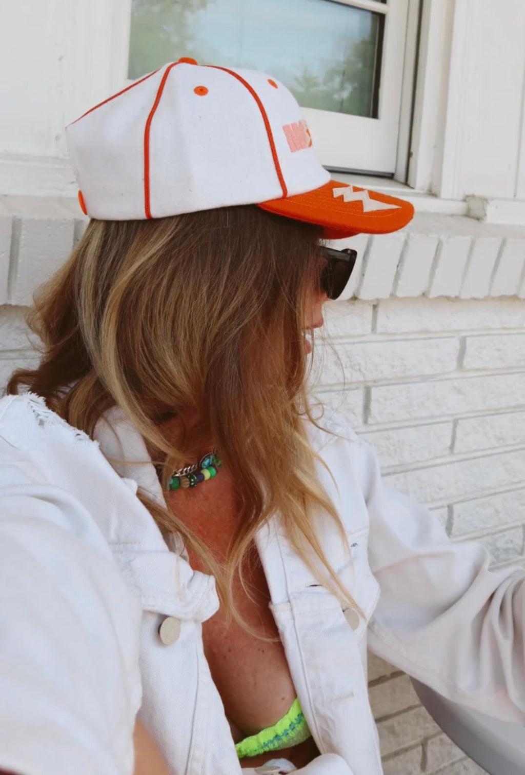 Happy Little Mother trucker hat orange and white – boutique accessories at The Corner Store on Christie Toronto
